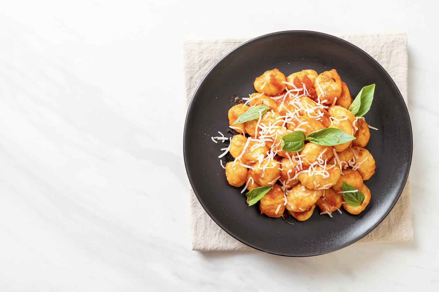 Potato gnocchi with tomato and basil