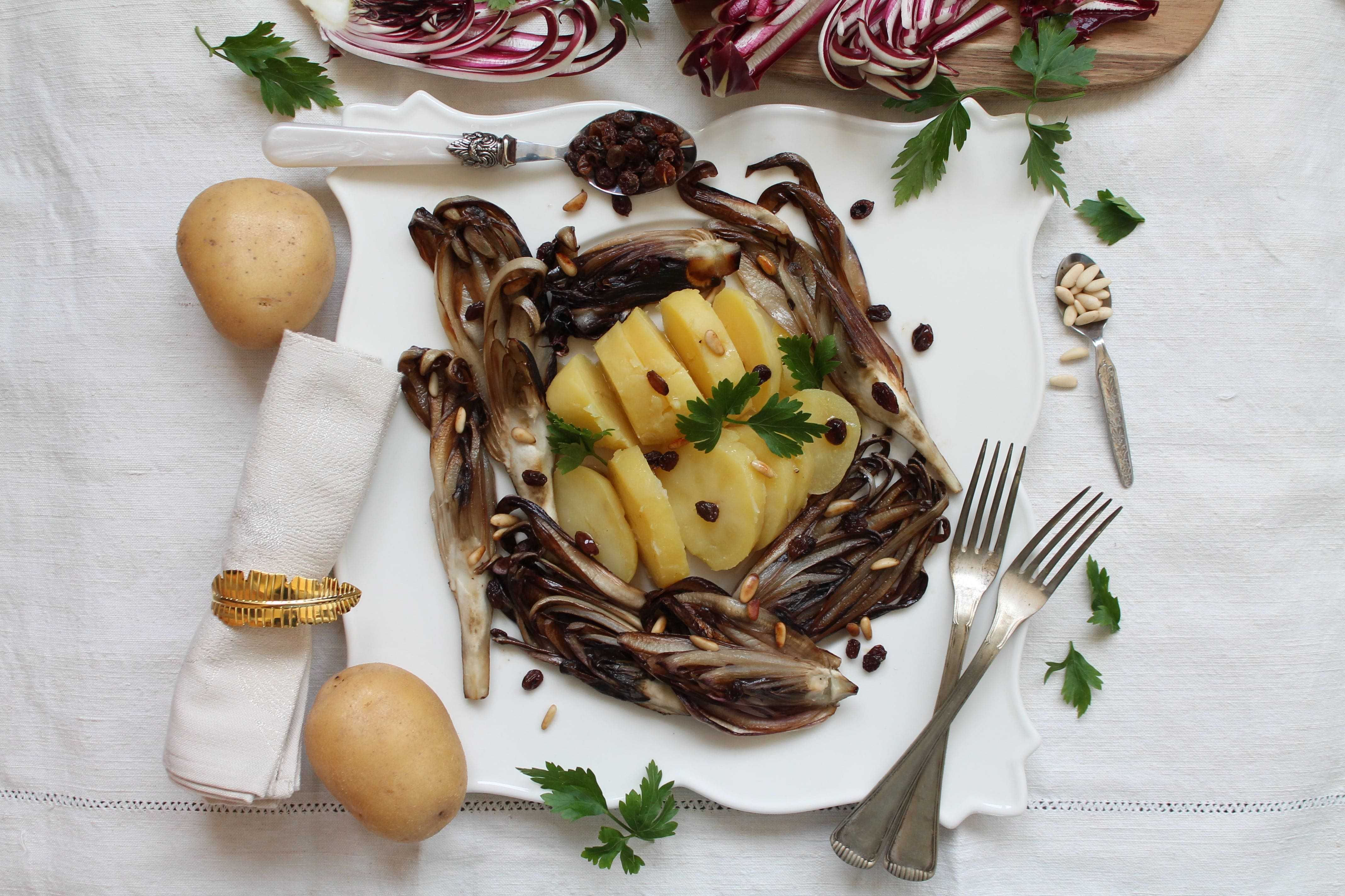 Potatoes with Treviso radicchio, pine nuts and raisins