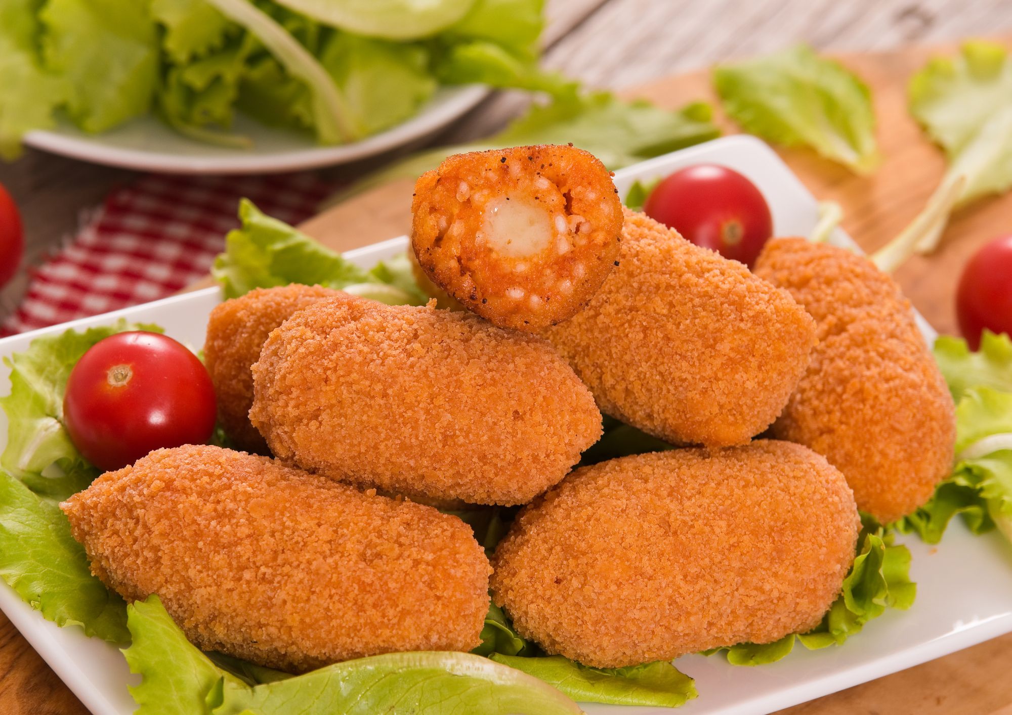 Tomato and mozzarella supplì croquettes