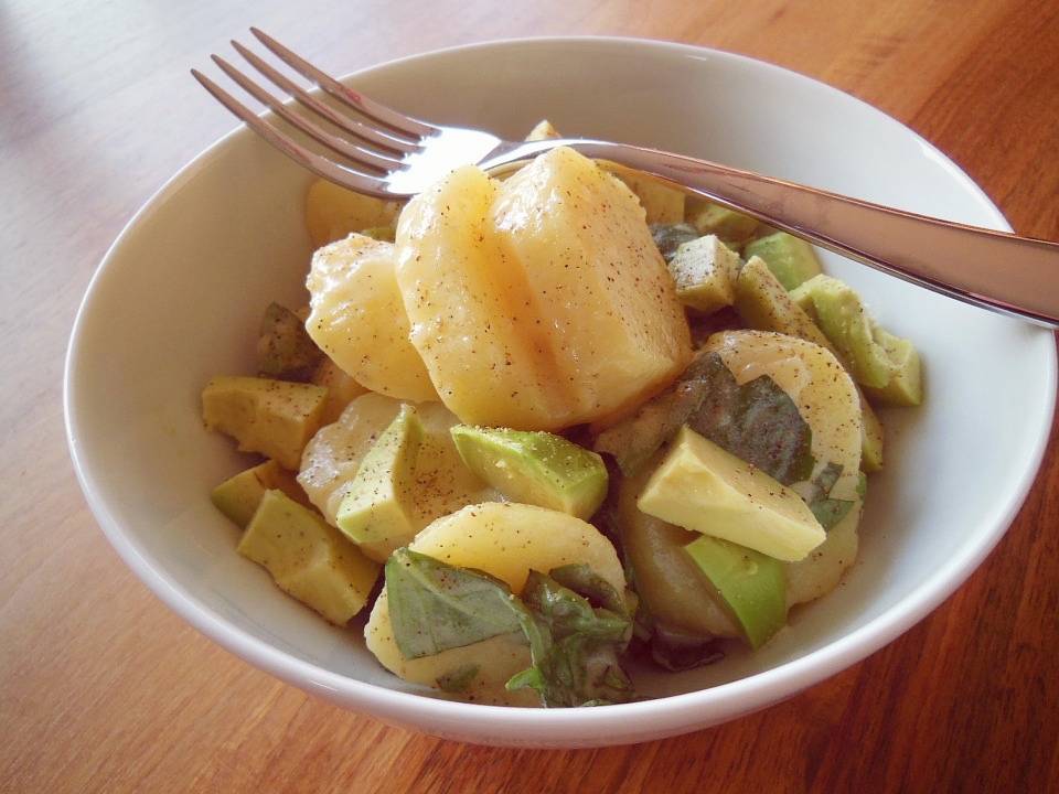 Potato salad with avocado and basil