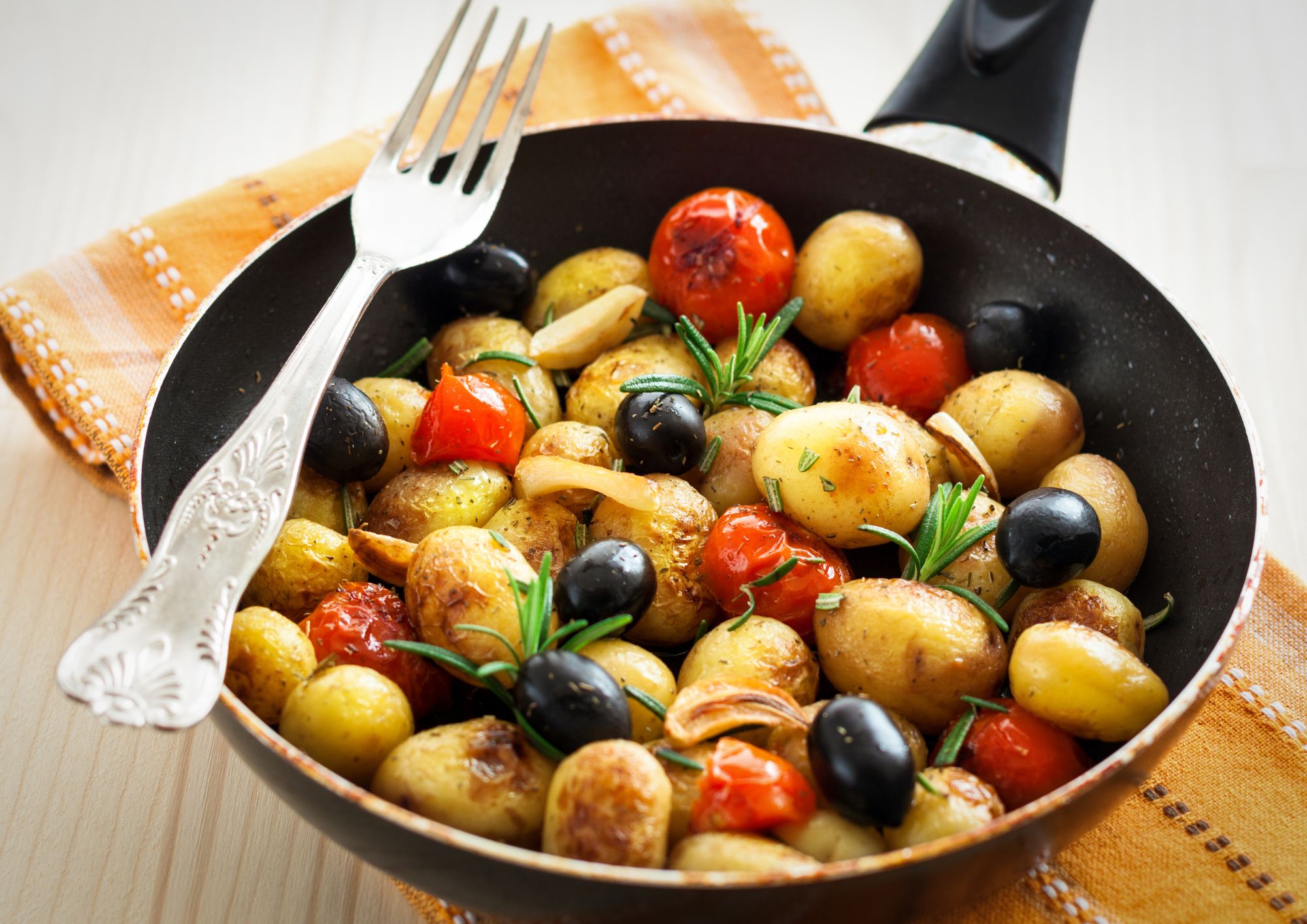 Mini Potatoes with baby tomatoes and black olives