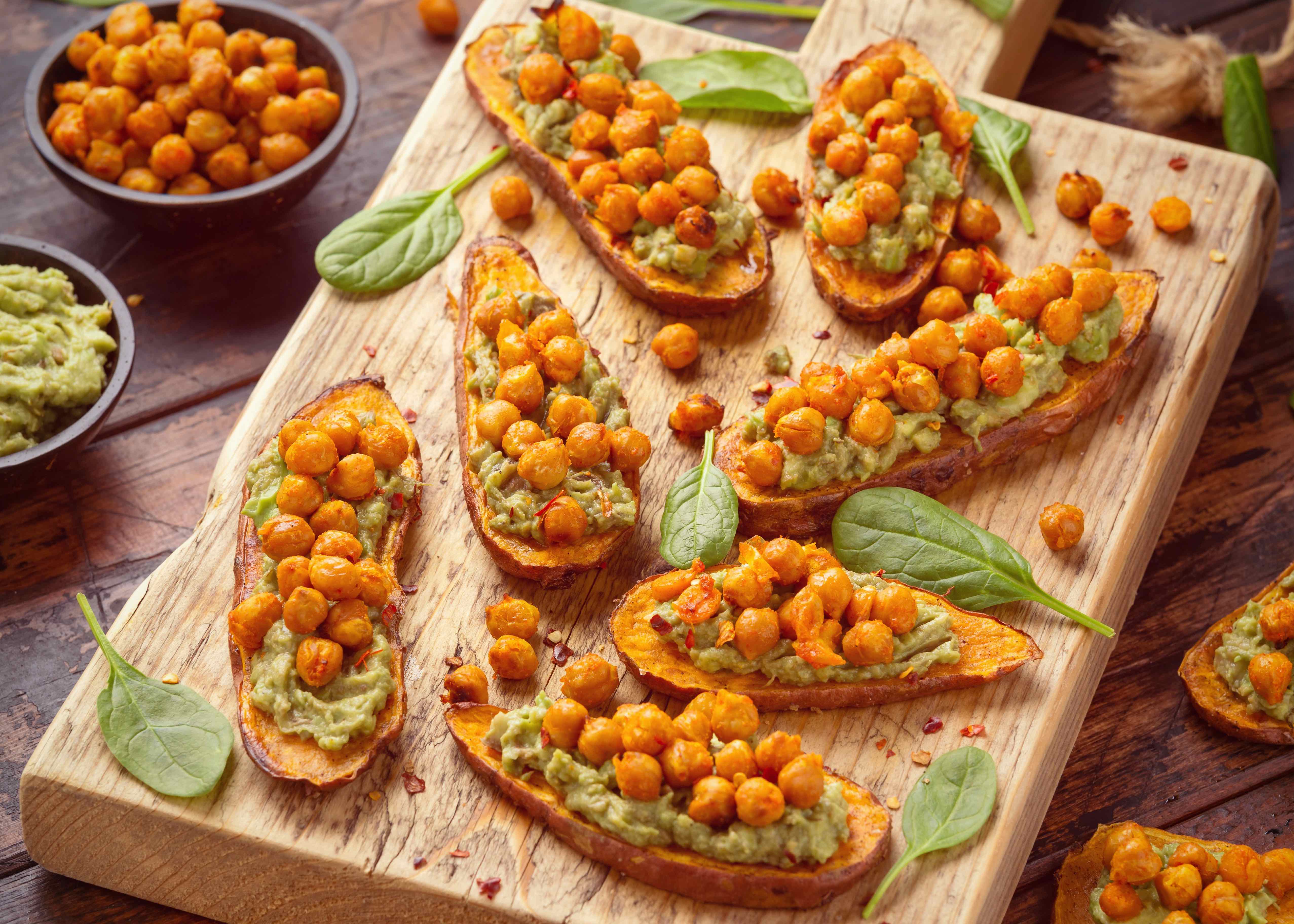 Sweet potato toast with creamy avocado sauce and chickpeas