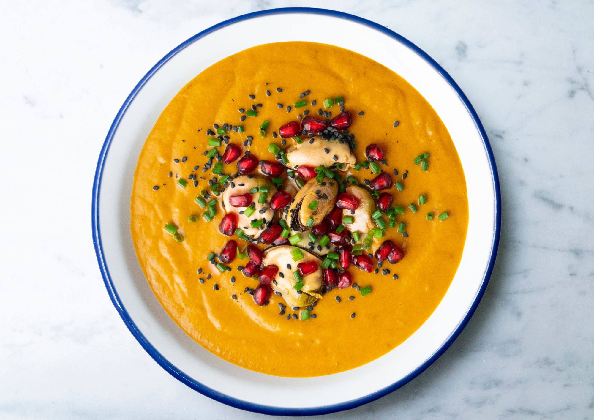 Puréed Melrose potato and carrot soup with mussels